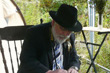 Philémon signing the livre d'or at Ste-Camille